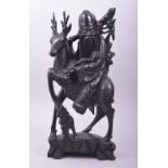 A CHINESE CARVED HARDWOOD AND METAL WIRE INLAID FIGURE of Shoulao and deer, the figure with inset