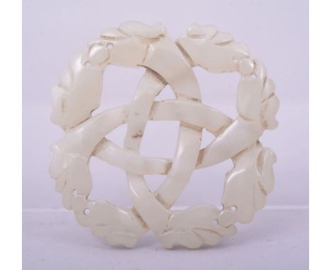 A CHINESE CARVED AND PIERCED JADE PENDANT, 5cm diameter.