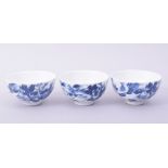 THREE CHINESE BLUE AND WHITE PORCELAIN TEA BOWLS, each painted with a landscape scene, 7.5cm
