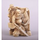 A GOOD JAPANESE CARVED IVORY OKIMONO of a figure with a sword and a demonic figure aloft, the