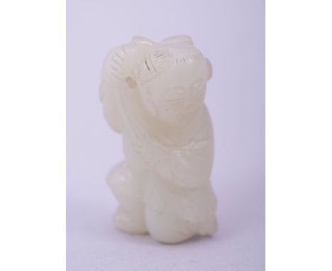 A SMALL CHINESE JADE FIGURAL CARVING, 4cm high.