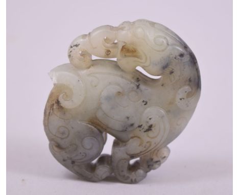 A CHINESE CARVED JADE PENDANT, 5.5cm.