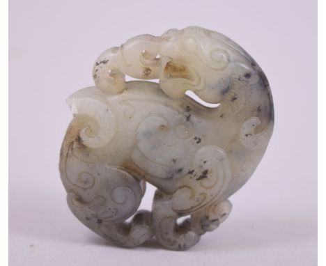 A CHINESE CARVED JADE PENDANT, 5.5cm.