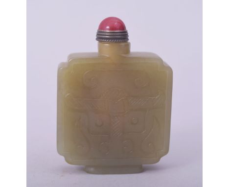 A CHINESE CARVED JADE SNUFF BOTTLE AND STOPPER, 6cm.