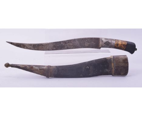 A LARGE INDO PERSIAN ENGRAVED DAGGER AND SCABBARD, 48cm long overall.