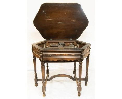 Atwater Kent Model 55C radio in an authentic Kiel golden voiced table, ca. 1929, USA. Hexagon shaped walnut parlor table with