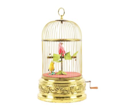 A very good example of an early German singing bird cage automaton with two birds. Overall very good condition, the birds hav