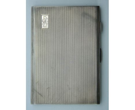 An engine turned hallmarked 1945 solid silver cigarette case. 12.5 cm wide. 6.7 troy ounces.