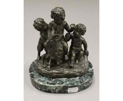 A patinated bronze Bacchic group on a marble plinth base. 18 cm high.