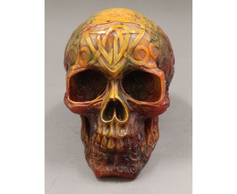 A model skull.  12.5 cm high x 10 cm wide.