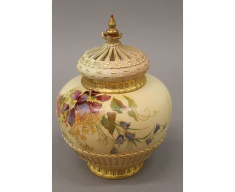 A Royal Worcester blush ivory pot pourri vase and cover. 19 cm high.