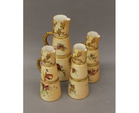 Four Royal Worcester blush ivory florally decorated ewers. The largest 26 cm high.