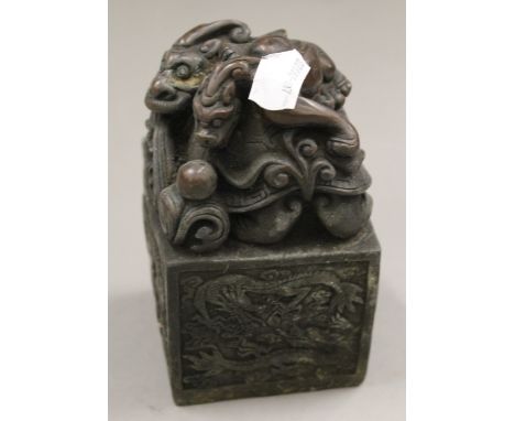 A bronze dragon seal. 12.5 cm high.