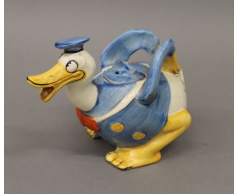 A Wade Heath Donald Duck teapot. 15.5 cm high.