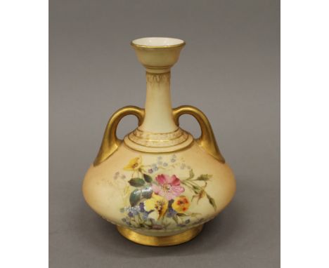 A Royal Worcester blush ivory florally decorated vase. 16 cm high.