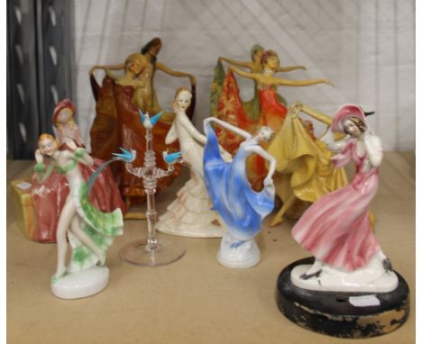 A quantity of various Wade and other Art Deco figurines. The largest 23 cm high.