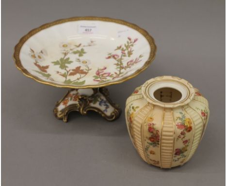 A Royal Worcester florally decorated tazza and a Royal Worcester blush ivory vase. The former 24.5 cm diameter.