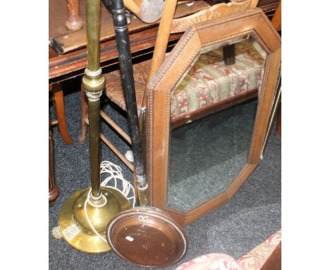 A brass standard lamp, two warming pans, a fire screen and an oak framed mirror. 