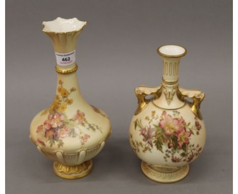 Two Royal Worcester blush ivory florally decorated vases. The largest 26 cm high.