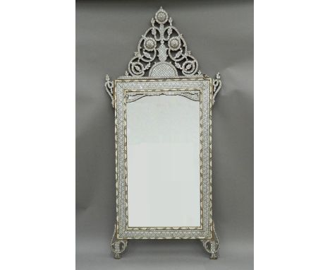 A Syrian mother-of-pearl mounted mirror. 194 cm high. The property of Germaine Greer.