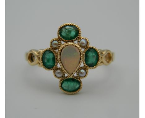 A 9 ct gold Georgian style opal, emerald and pearl ring. Ring Size N/O. 