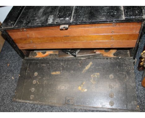 A fitted carpenters chest with tools