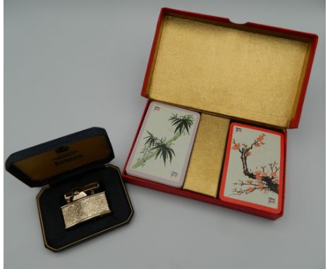 A cased set of Glen Line playing cards and a boxed Ronson lighter. 