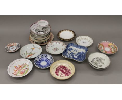 A collection of various 18th/19th century porcelain dishes, saucers, etc.