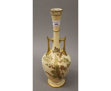 A Royal Worcester blush ivory twin handled vase. 32 cm high.