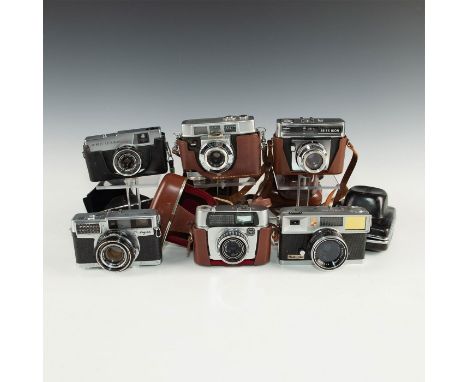 Vintag 35mm camera from different makers, kitschy designs.Group of 6 vintage semi automatic cameras. One is The Quickmatic EE