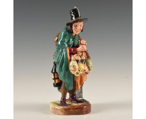 A tradesman with many masks to sell.From the original production of this long popular figurine, modeled in 1952 and released 