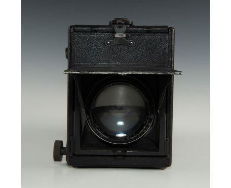 Iconic single lens reflex camera with a mirror and prism system.The historic Graflex Reflex served as the companion the legen