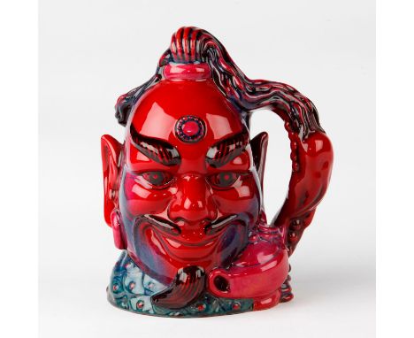 Limited edition flambe coloration character jug.This jug was the first to decorated in flambe. Flambe is characterized a glaz