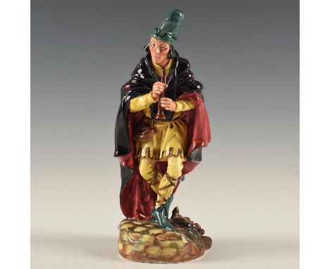 Excellent detail, yellow, purple, green, black colorway.Modeled as the storybook Pied Piper of Hamelin, decorated in a colorw
