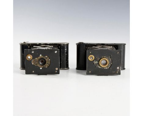 Pair of miniature decorative folding cameras.One camera still includes its stylist.  Issued: Early 20th c. Dimensions: 3.5"H 