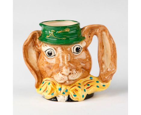 Large character jug designed for the Alice in Wonderland series.Jug D6776 shows March Hare in a green hat and a yellow bow ti