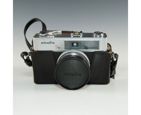 Vintage mid-century film camera with built in meter, case, cap.Production began in Japan in 1966. It has a well-respected Rok