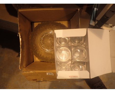 Unused glass punch bowl twelve cups and a set of glass coffee cups