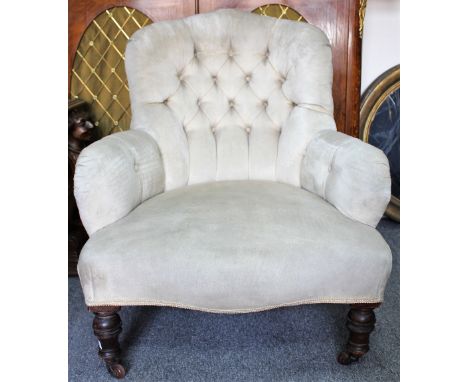 A VICTORIAN CREAM COLOURED BUTTON UPHOLSTERED LOW ARMCHAIR 72cm wide x 88cm high