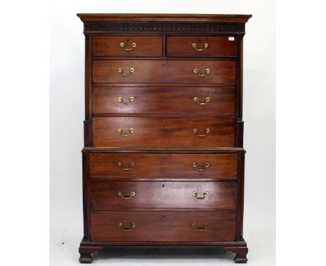A GEORGE III MAHOGANY TALLBOY with two short and six long drawers with brass swan neck handles and ogee bracket feet 120cm wi
