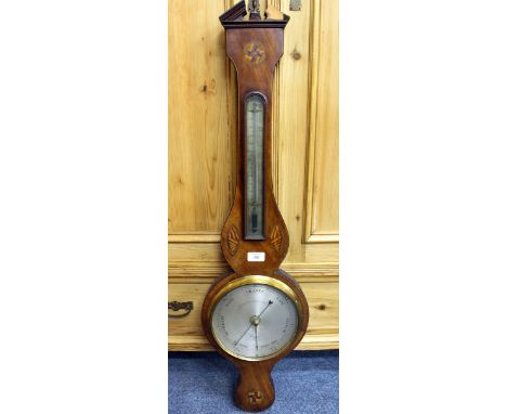 A VICTORIAN WHEEL BAROMETER  with conch shell inlaid and silvered dial by Lione & Somalbcio, measures 97cm approx 