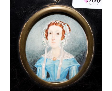 AN EARLY TO MID 19TH CENTURY MINIATURE PORTRAIT of a lady wearing a bonnet painted on ivory 8cm x 7cm, further miniature pict