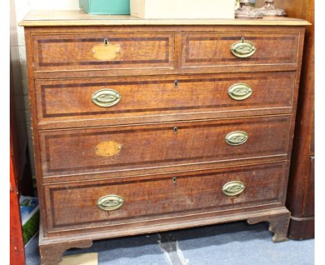 A GEORGIAN OAK CHEST of two short and three long drawers with bracket feet 103cm wide x 53cm deep x 95cm high 