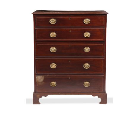 AN EARLY 20TH CENTURY MAHOGANY TALLBOY  with fitted desk in the top two drawers above three long drawers, standing on bracket
