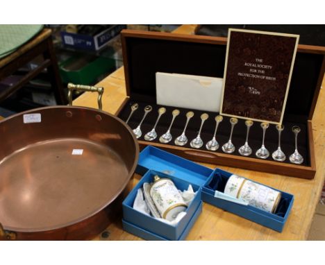 A CASED SET OF TWELVE RSPB SILVER TEA SPOONS each decorated with a different bird, together with a copper jam pan and three B