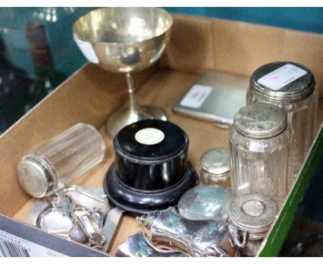 A SELECTION OF SILVER TOPPED DRESSING TABLE REQUISITES a London silver trophy on ebonised plinth, a pair of silver pepperette