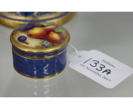 A ROYAL WORCESTER TRINKET BOX WITH LID with handpainted decoration of fruit on a blue mottled ground, with a puce mark to the