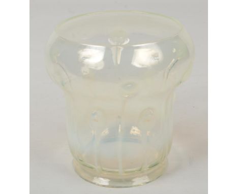 An Art Nouveau vaseline glass lamp shade, 12.5cm, lower rim diameter 8.75cm.  Very good condition. No chips or cracks.