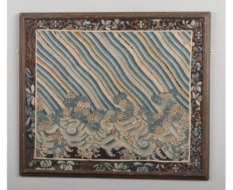 A 19th century framed Cantonese embroidered silk panel. Decorated with stripes, wave scrolls and fruit bats under a flower bo