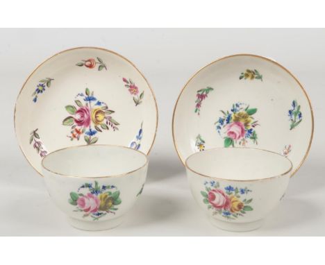A pair of Caughley teabowls and saucers. With gilt rims and painted in coloured enamels with back to back roses. Saucers 123c